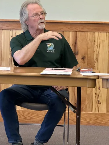 Conservation director to discuss wind turbine placement guidelines with energy companies